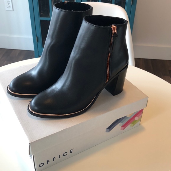 black booties with gold detail